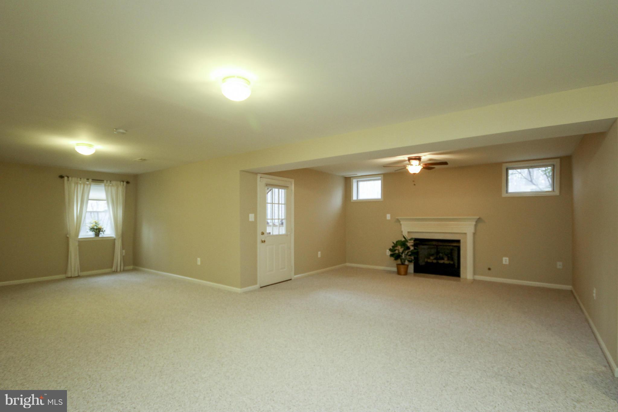 7890 Pembridge Road Manassas, VA 20112 - Photo 25 of 25 Finished Basement with 2nd Fireplace