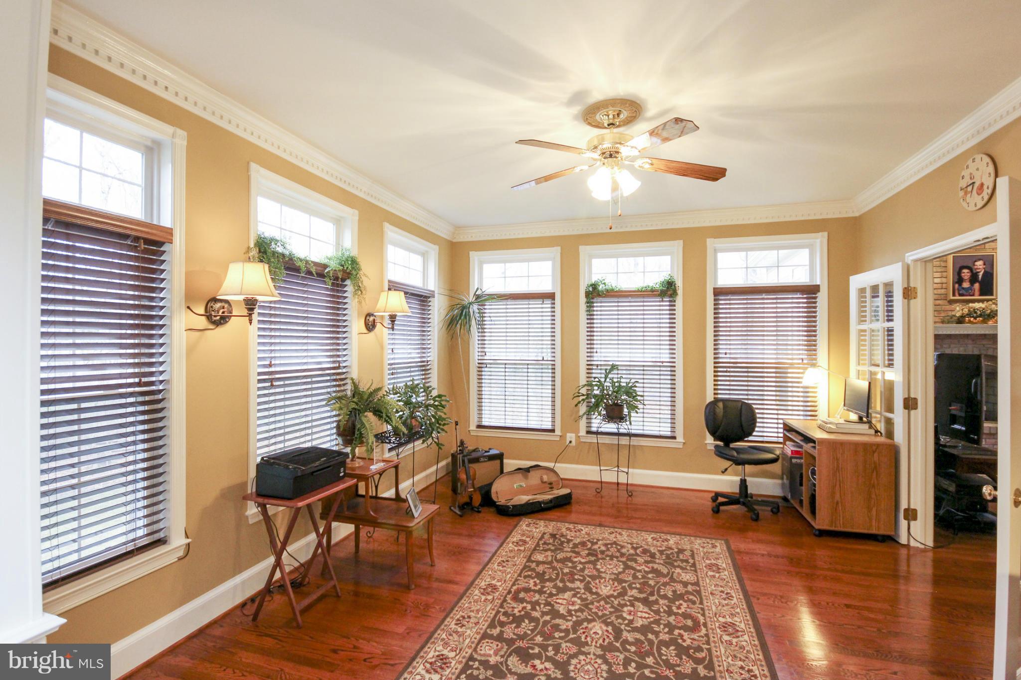 7890 Pembridge Road Manassas, VA 20112 - Photo 7 of 25 Library/Sunroom with Custom Built-ins