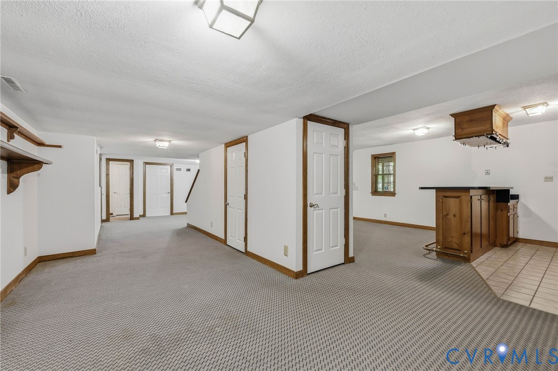 3201 East Brigstock Road Midlothian, VA 23113 - Photo 29 of 72 a view of a livingroom with a staircase