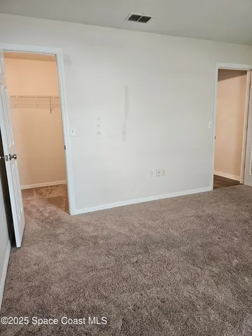 an empty room with an entryway