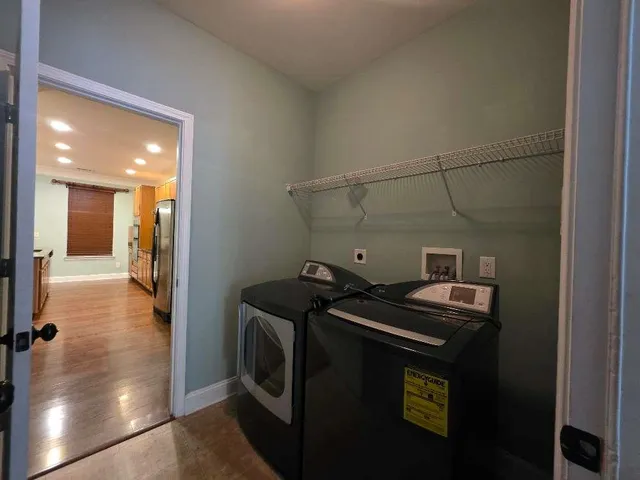 a utility room with dryer and washer