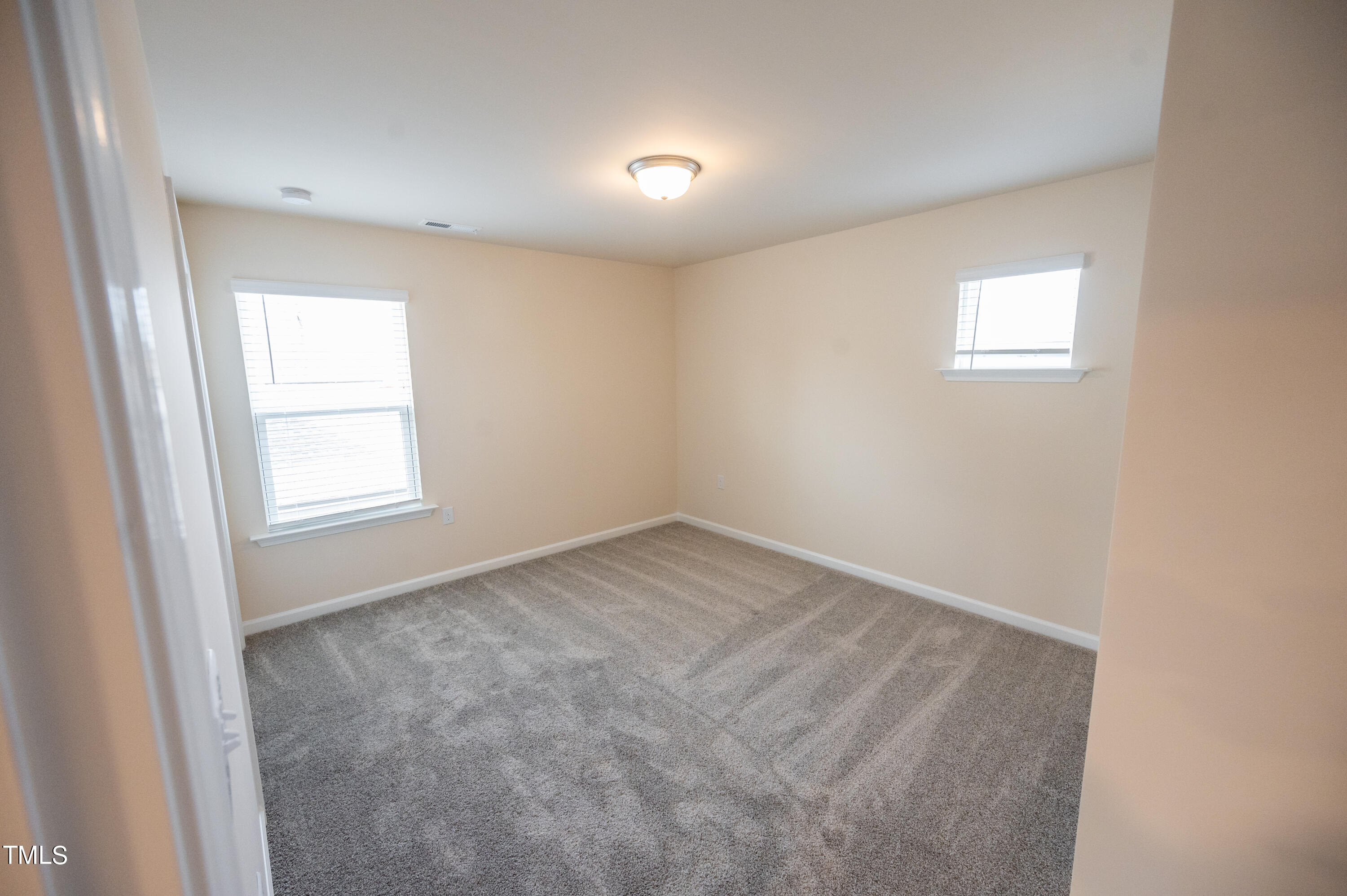 5716 Agrinio Way Raleigh, NC 27603 - Photo 17 of 25 Bedroom Two