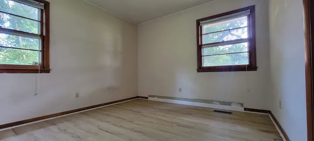 an empty room with a window