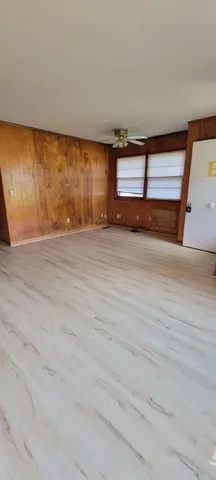 a kitchen with cabinets a sink and appliances