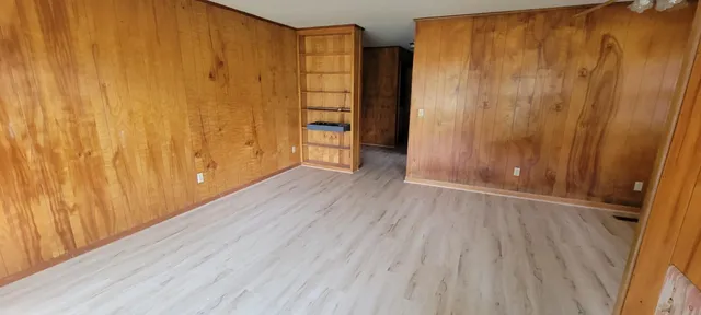 wooden floor and windows in an empty room