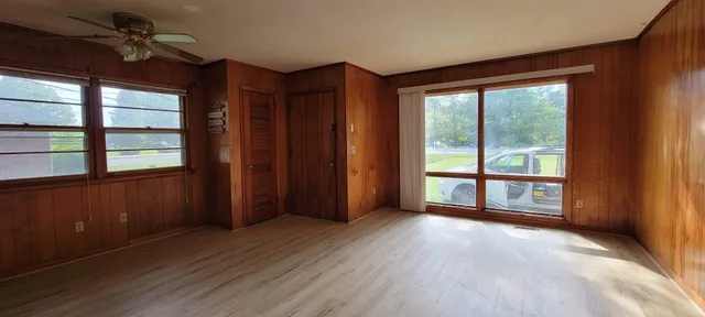a view of a bathroom from a hallway