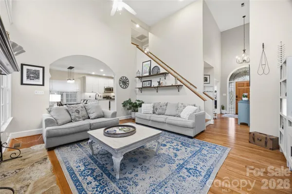 a living room with furniture and a rug