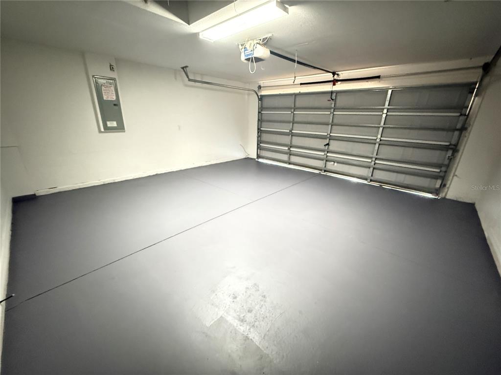 61 Laurel Drive Ocala, FL 34480 - Photo 13 of 14 a view of a garage with stairs