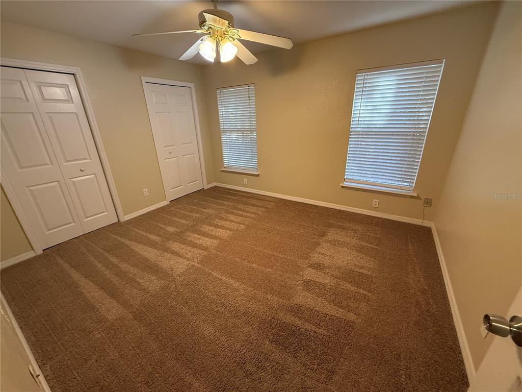 61 Laurel Drive Ocala, FL 34480 - Photo 7 of 14 a view of an empty room with a window