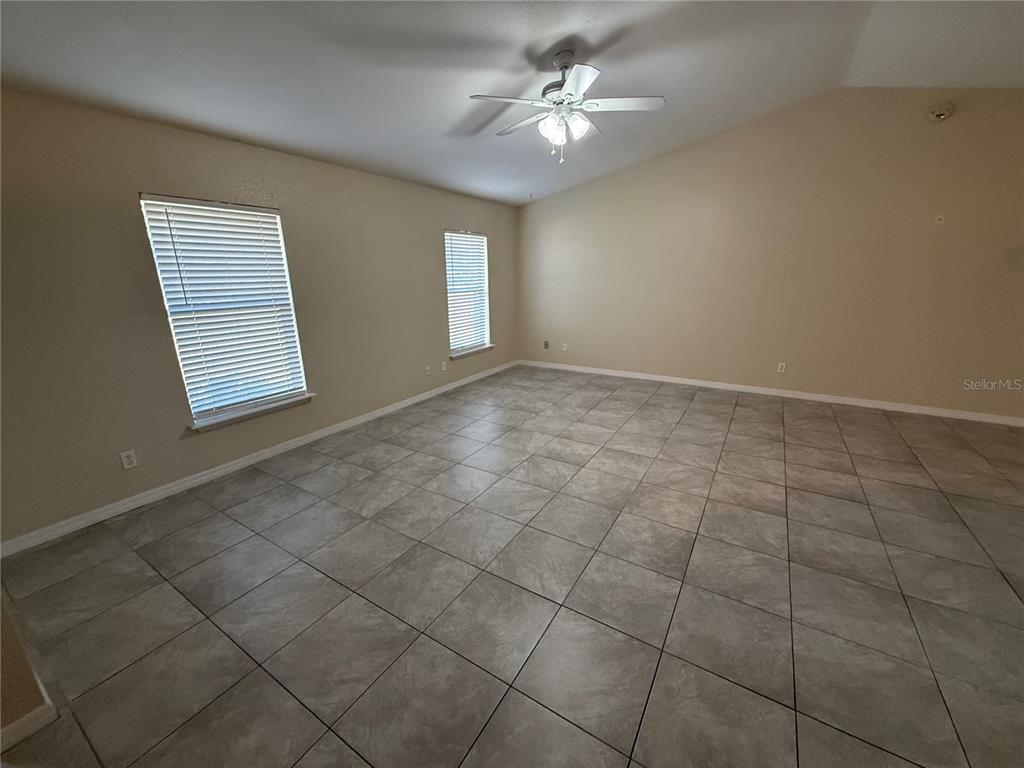 61 Laurel Drive Ocala, FL 34480 - Photo 9 of 14 a view of an empty room with a window