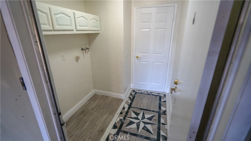 1185 Mountain Gate Road Upland, CA 91786 - Photo 16 of 39 laundry area entrance from garage