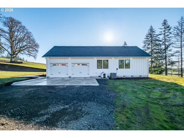 a view of a backyard with garden