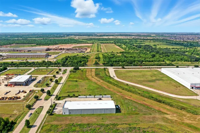 a view of a swimming pool with a balcony