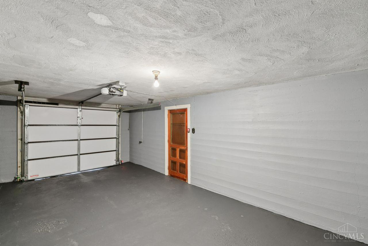 5258 Shepherd Road Cincinnati, OH 45223 - Photo 39 of 43 Wow! Look at this clean 1 car Garage! Features include a New Garage Door, a Garage Door Opener, and an attractive Screen Door that leads inside to the Family Room!