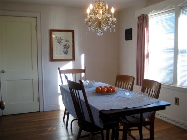 7 Pilgrim Way Walpole, MA 02032 - Photo 3 of 17 a view of a dining room with furniture window and wooden floor