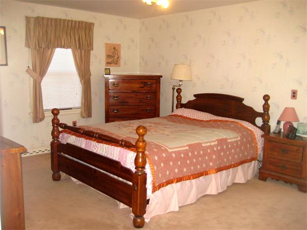 7 Pilgrim Way Walpole, MA 02032 - Photo 7 of 17 a bedroom with a bed and a dresser
