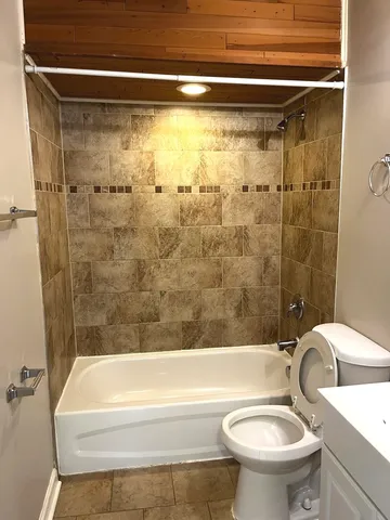 a bathroom with a sink and a toilet
