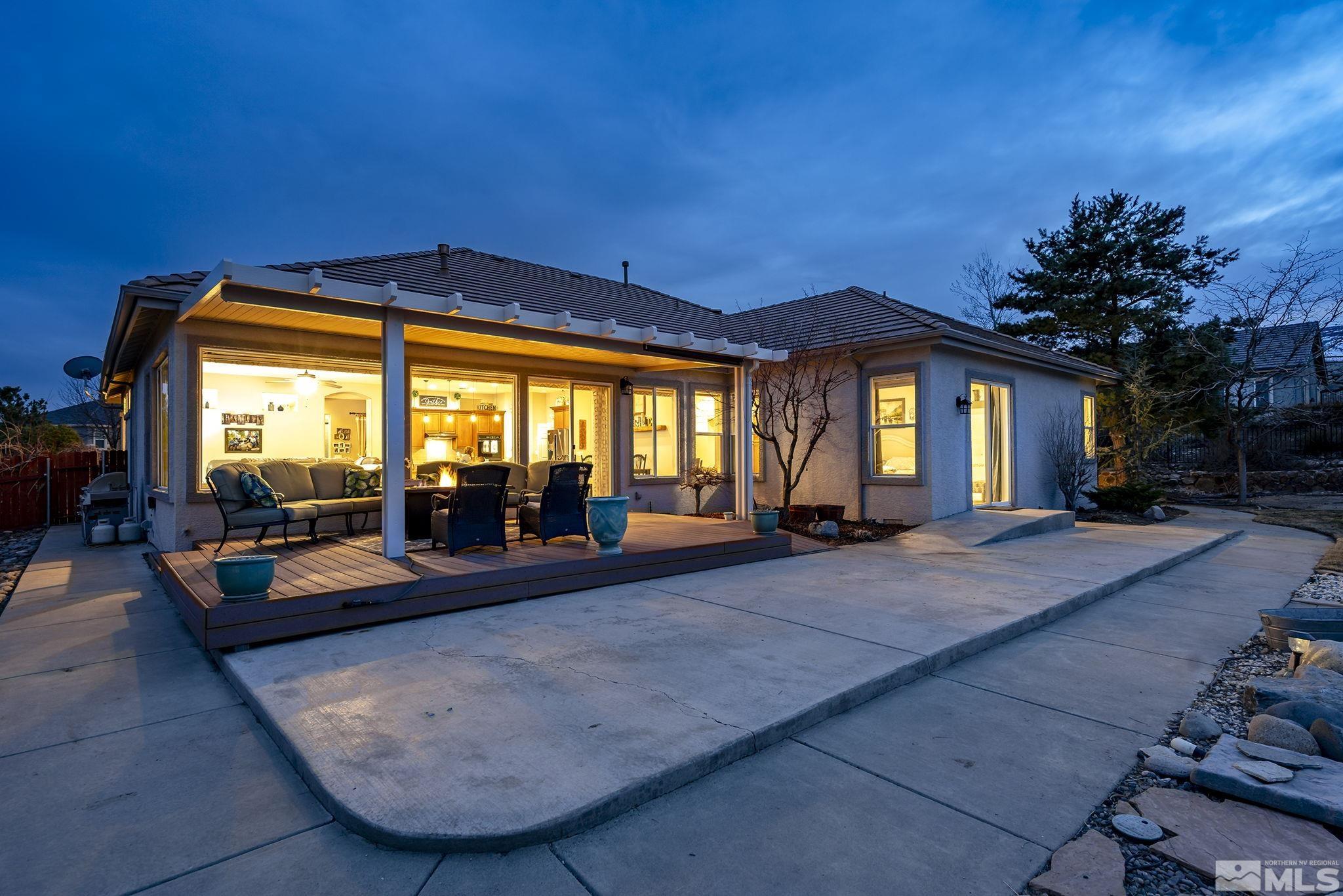 2095 North Tesuque Road Reno, NV 89511 - Photo 33 of 40 a view of a house with swimming pool and sitting area