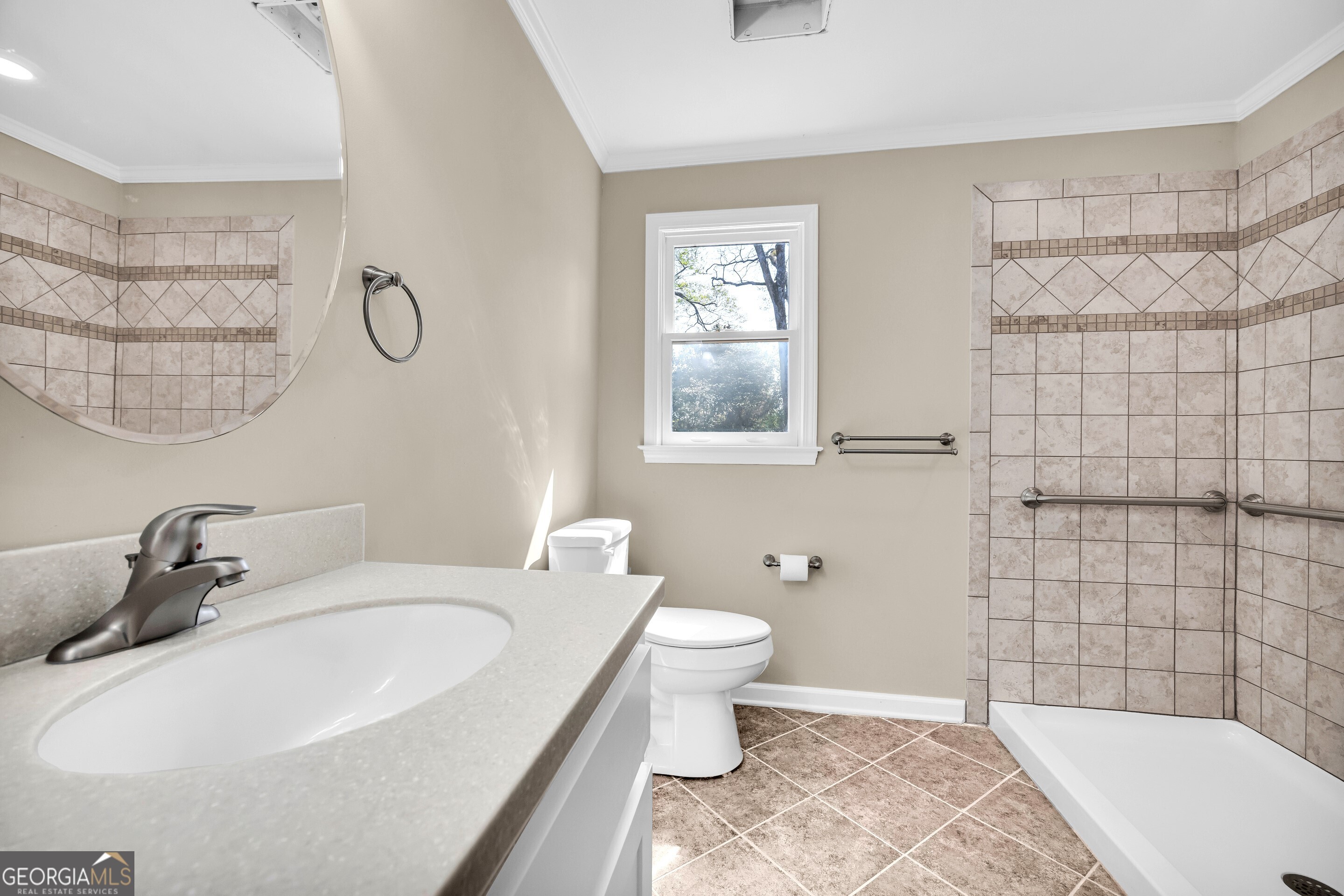 100 Broad Street Bowman, GA 30624 - Photo 35 of 65 a bathroom with a sink a toilet and shower