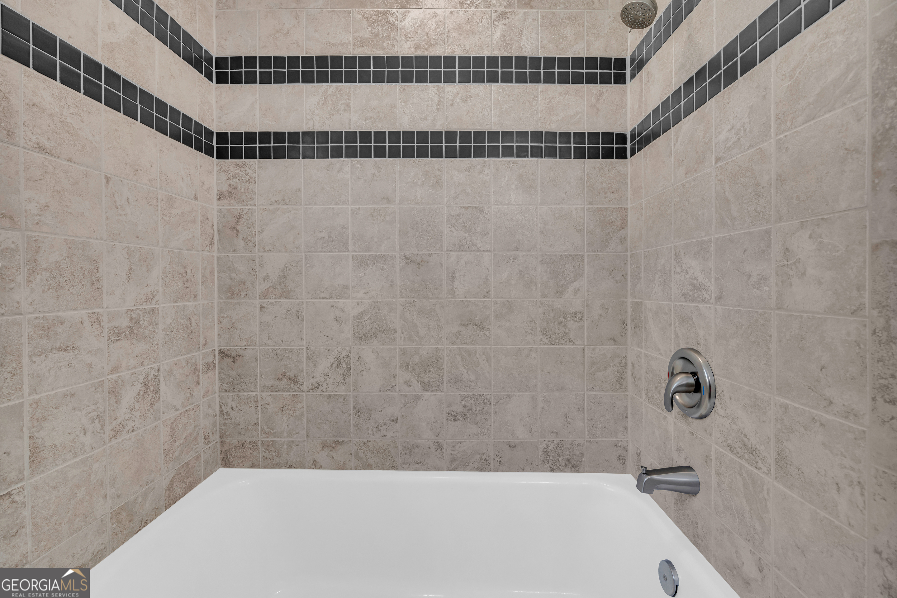 100 Broad Street Bowman, GA 30624 - Photo 41 of 65 a bathroom with a bathtub and shower