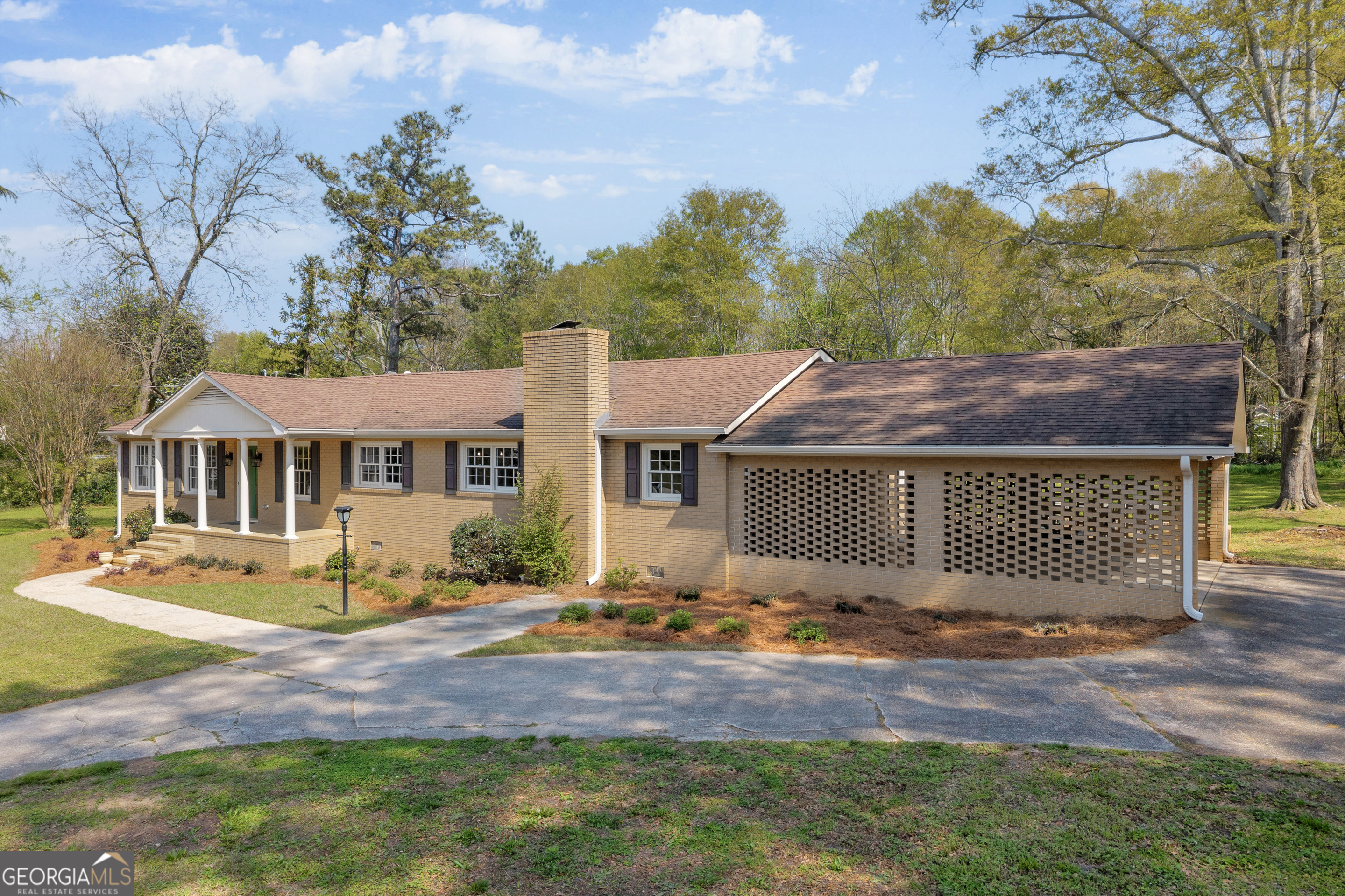 100 Broad Street Bowman, GA 30624 - Photo 51 of 65 a view of a house with a yard