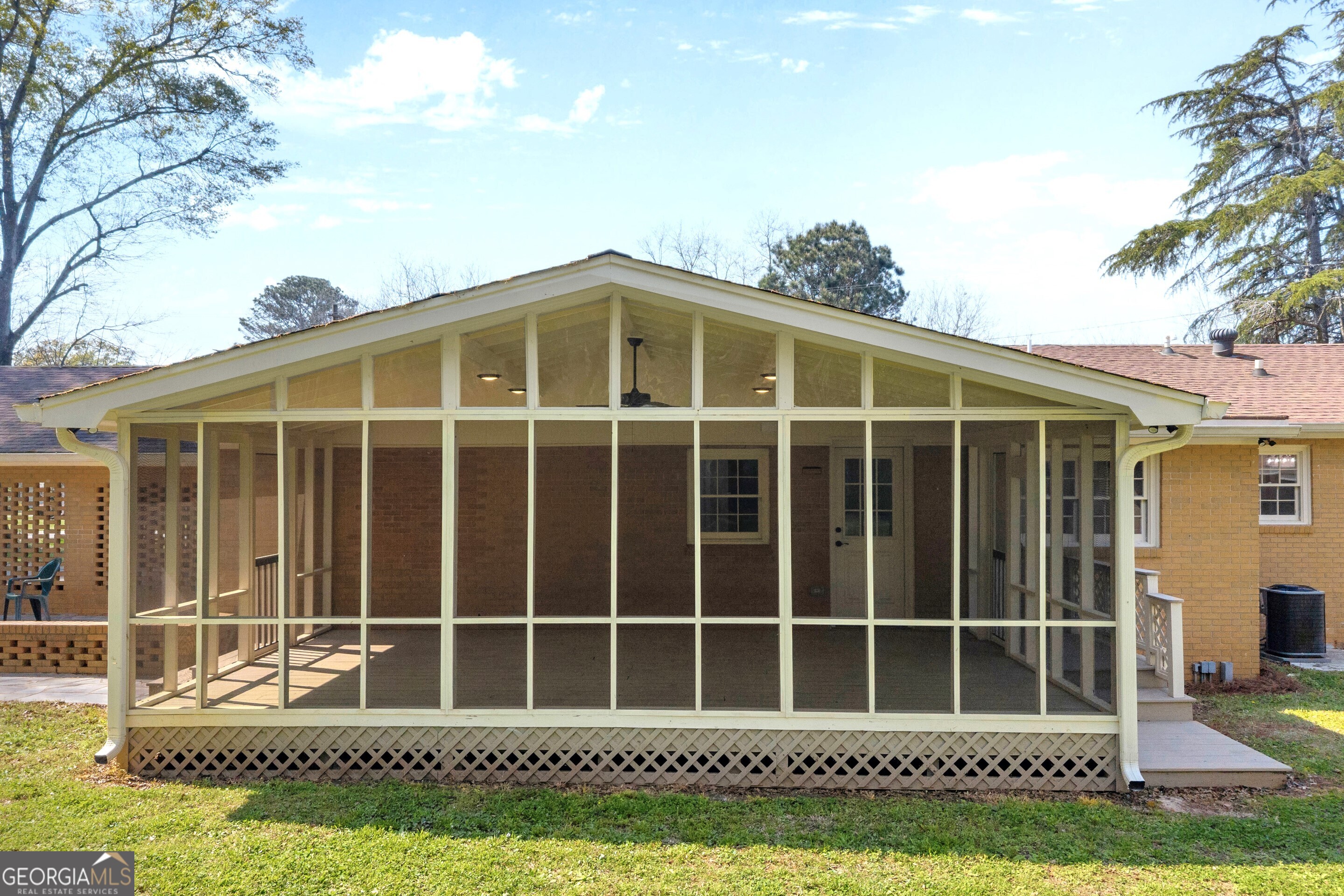 100 Broad Street Bowman, GA 30624 - Photo 55 of 65 a front view of a house with a garden