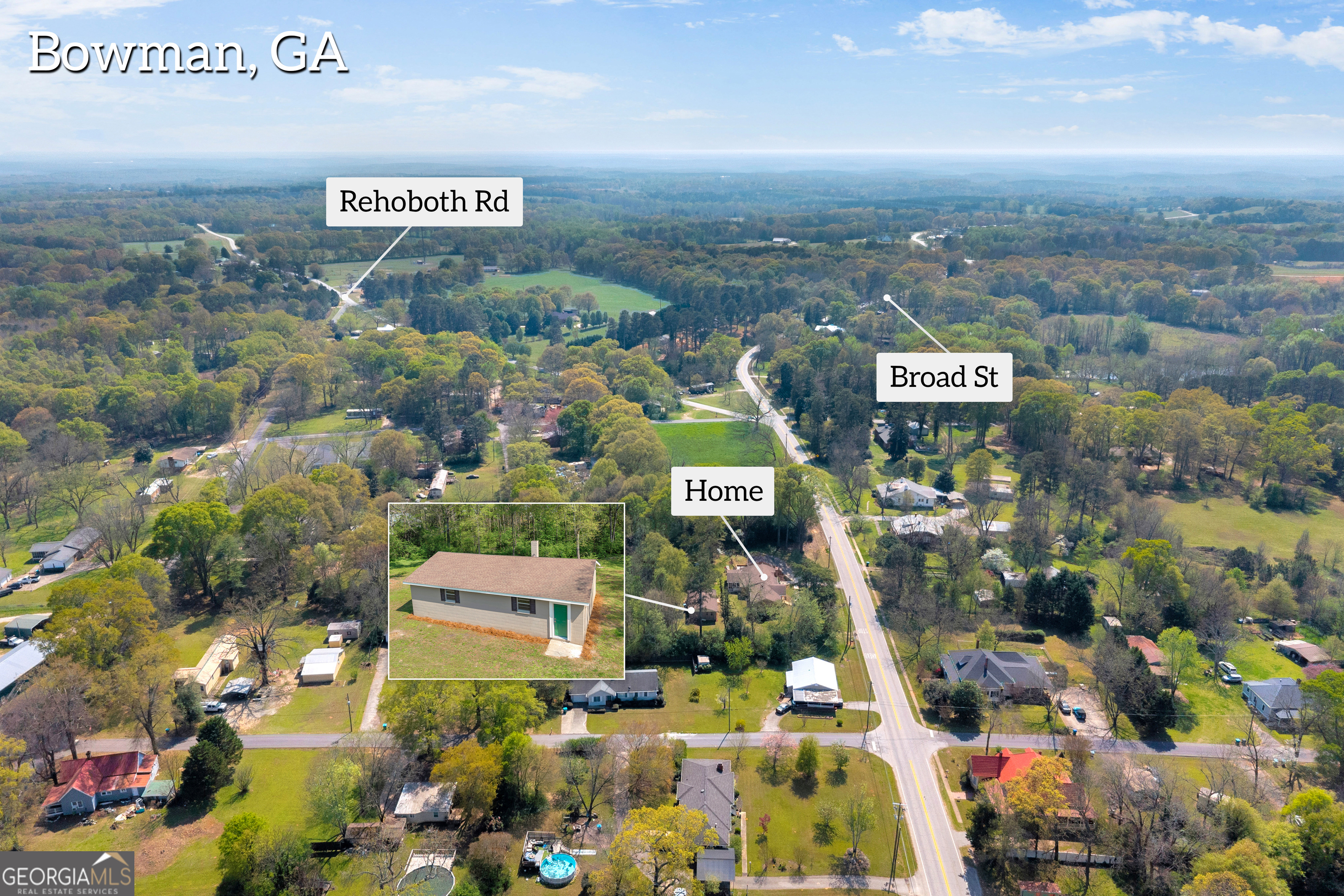 100 Broad Street Bowman, GA 30624 - Photo 62 of 65 an aerial view of residential building and parking space