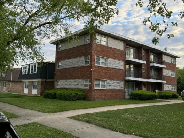 a view of building with yard