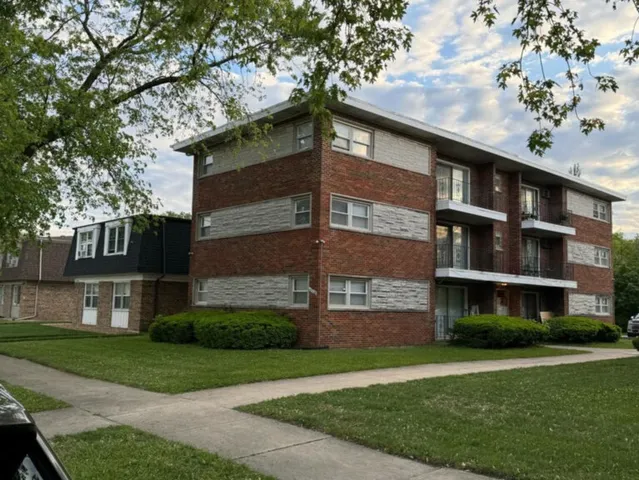 a view of building with yard