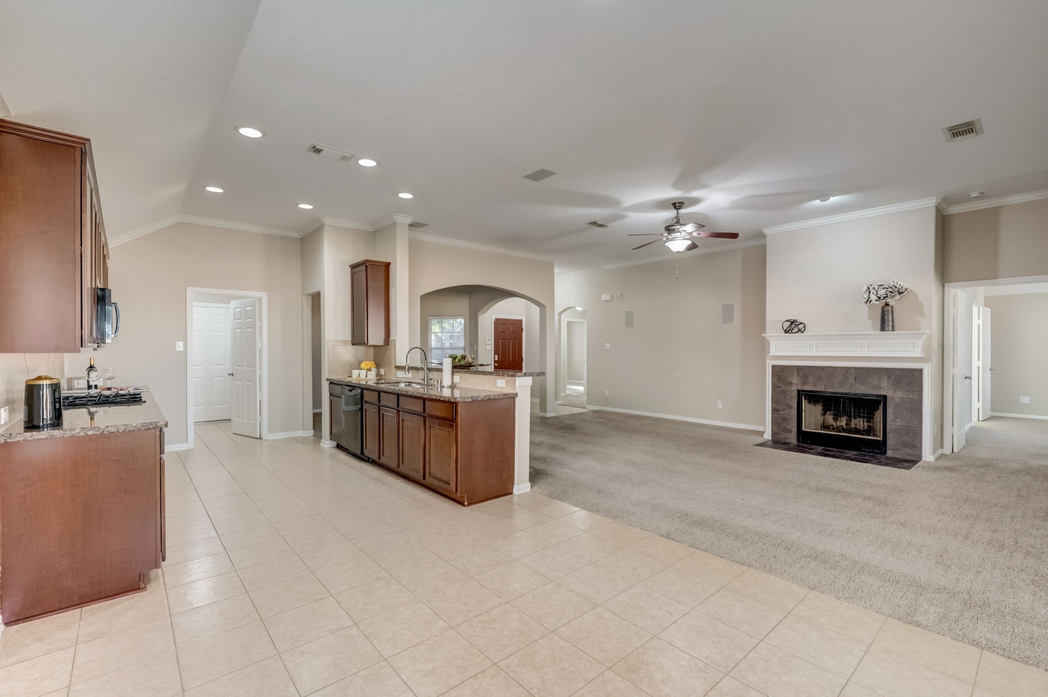 7219 Palmito Ranch Drive Richmond, TX 77406 - Photo 15 of 32 a large white kitchen with a large window