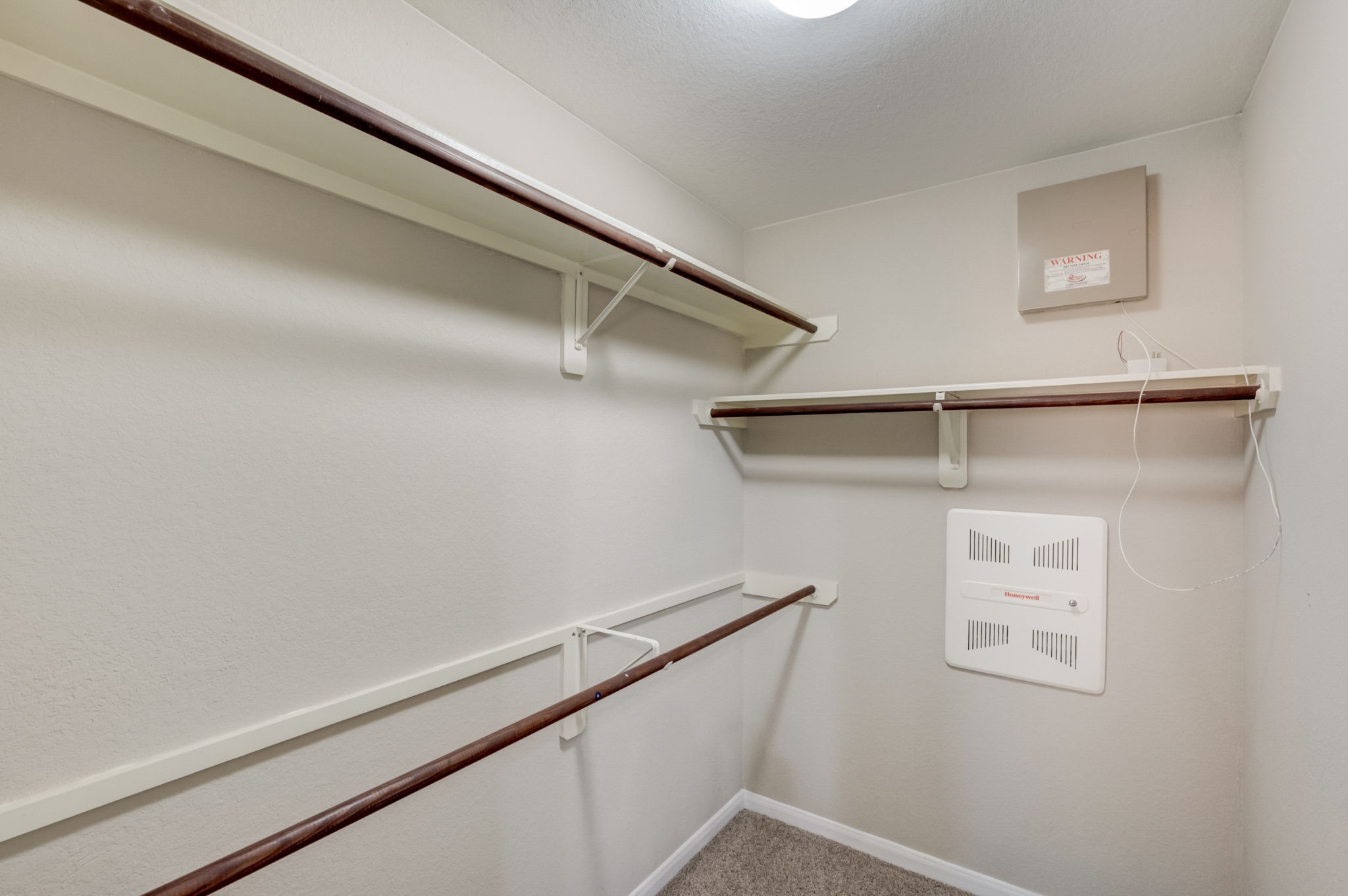 7219 Palmito Ranch Drive Richmond, TX 77406 - Photo 32 of 32 a view of small space with racks on the wall