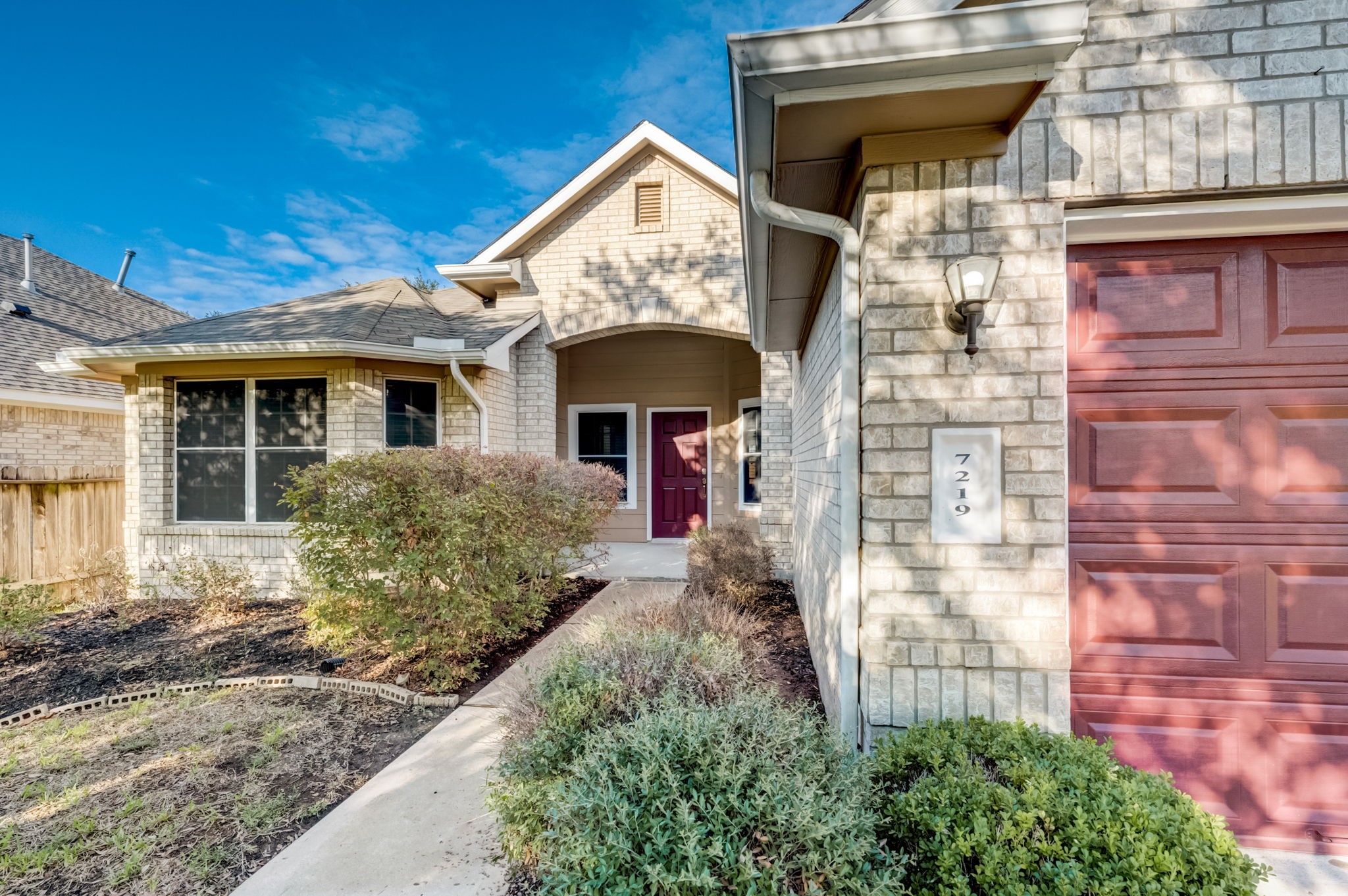 7219 Palmito Ranch Drive Richmond, TX 77406 - Photo 4 of 32 a front view of a house with garden