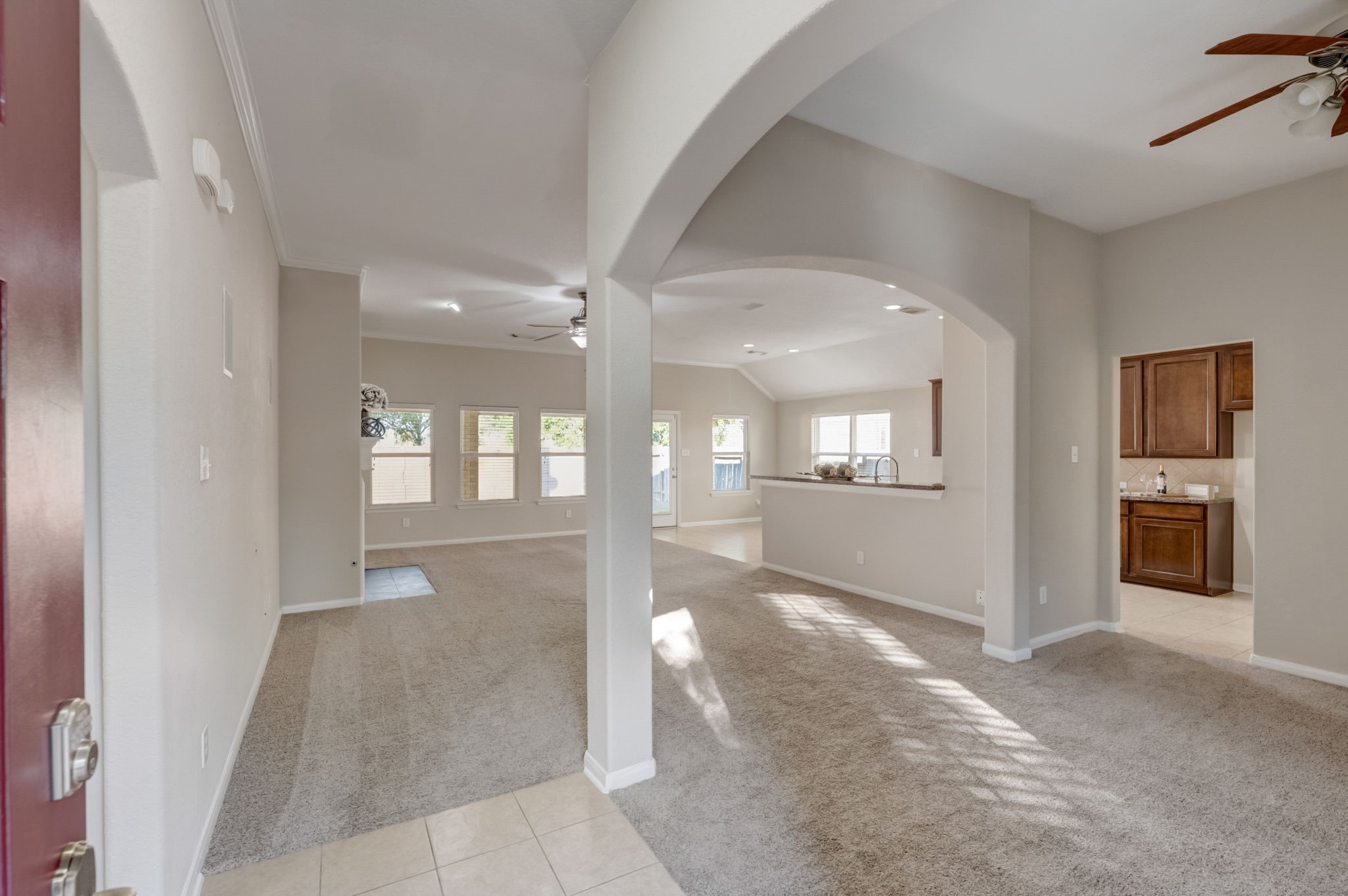 7219 Palmito Ranch Drive Richmond, TX 77406 - Photo 6 of 32 a view of livingroom with hardwood floor and a ceiling fan