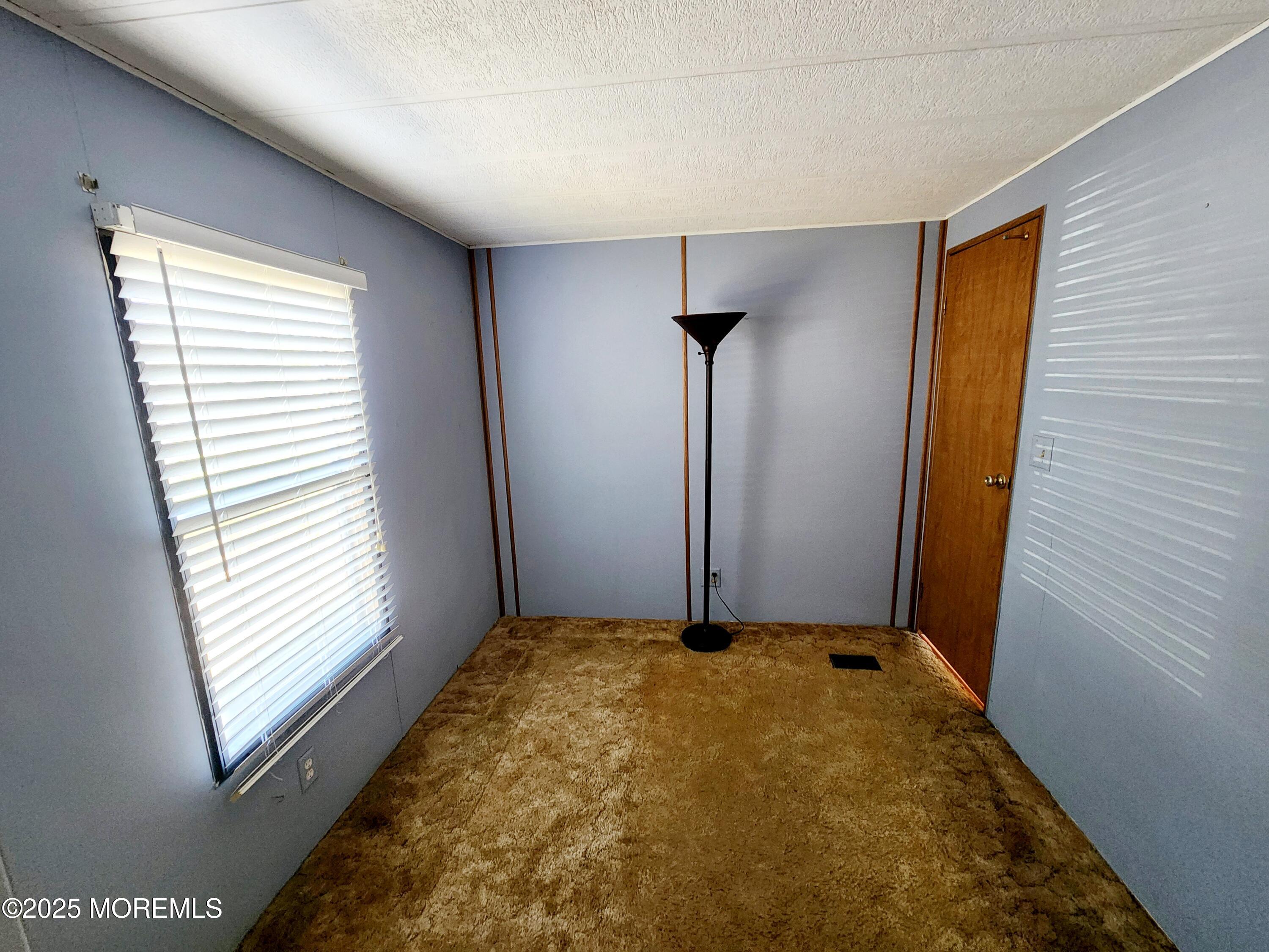 5 Fallow Drive Manalapan, NJ 07726 - Photo 14 of 23 a view of an empty room with a window