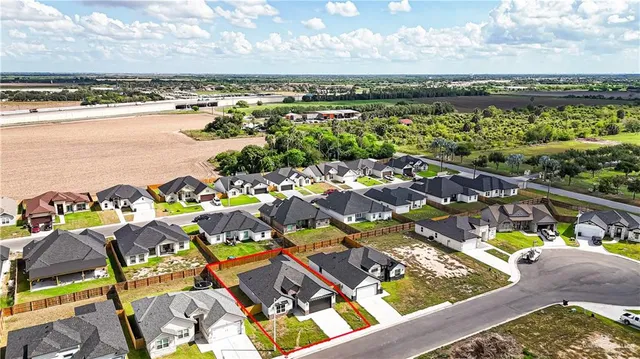 a view of a city with an ocean