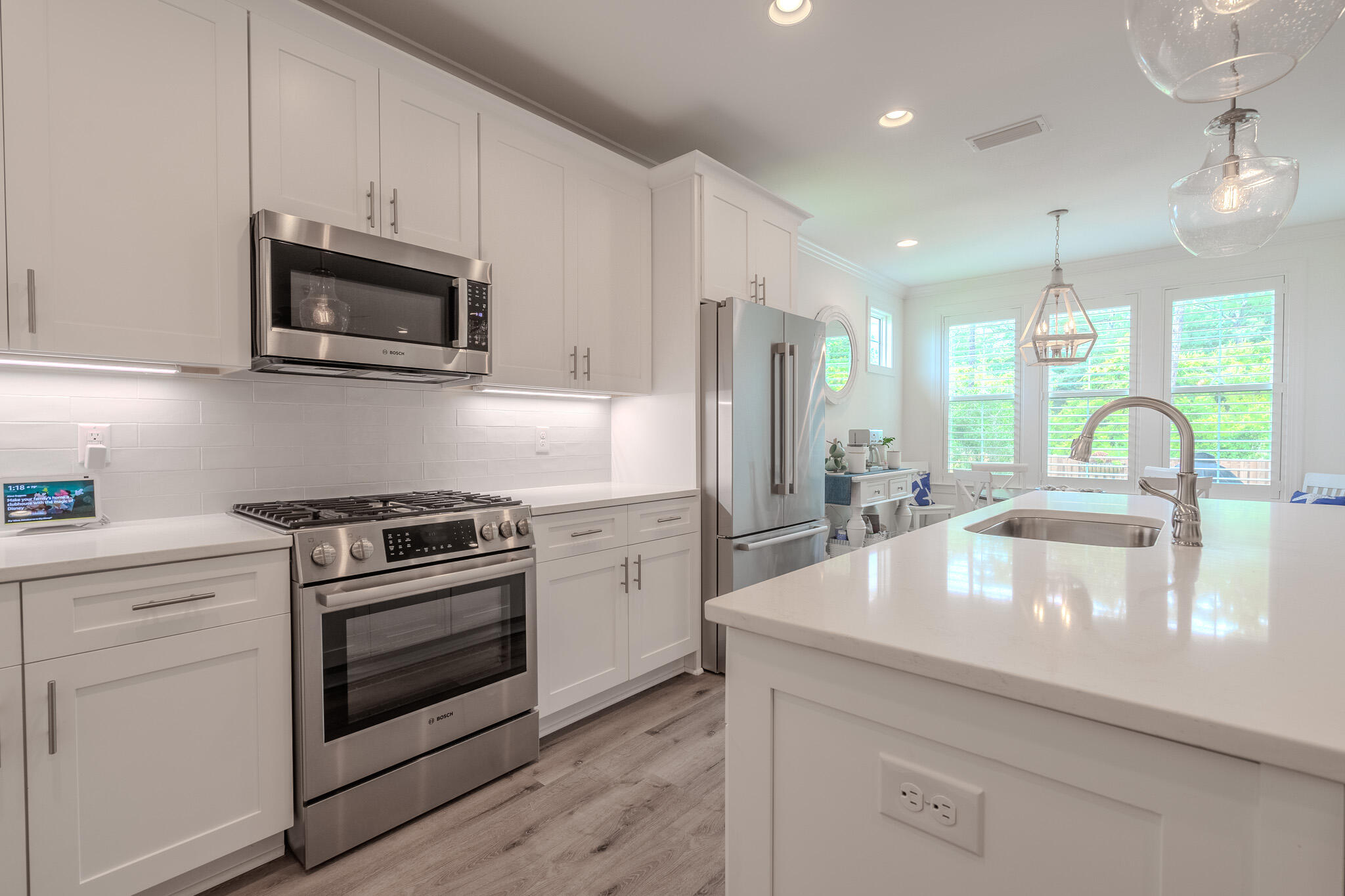 75 Conifer Ct Inlet Beach Inlet Beach, FL 32461 - Photo 20 of 74 a kitchen with stainless steel appliances granite countertop a stove microwave and sink