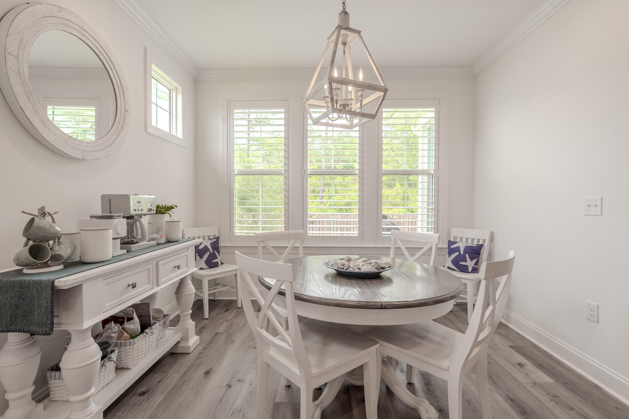75 Conifer Ct Inlet Beach Inlet Beach, FL 32461 - Photo 23 of 74 a view of a dining room with furniture a chandelier and wooden floor