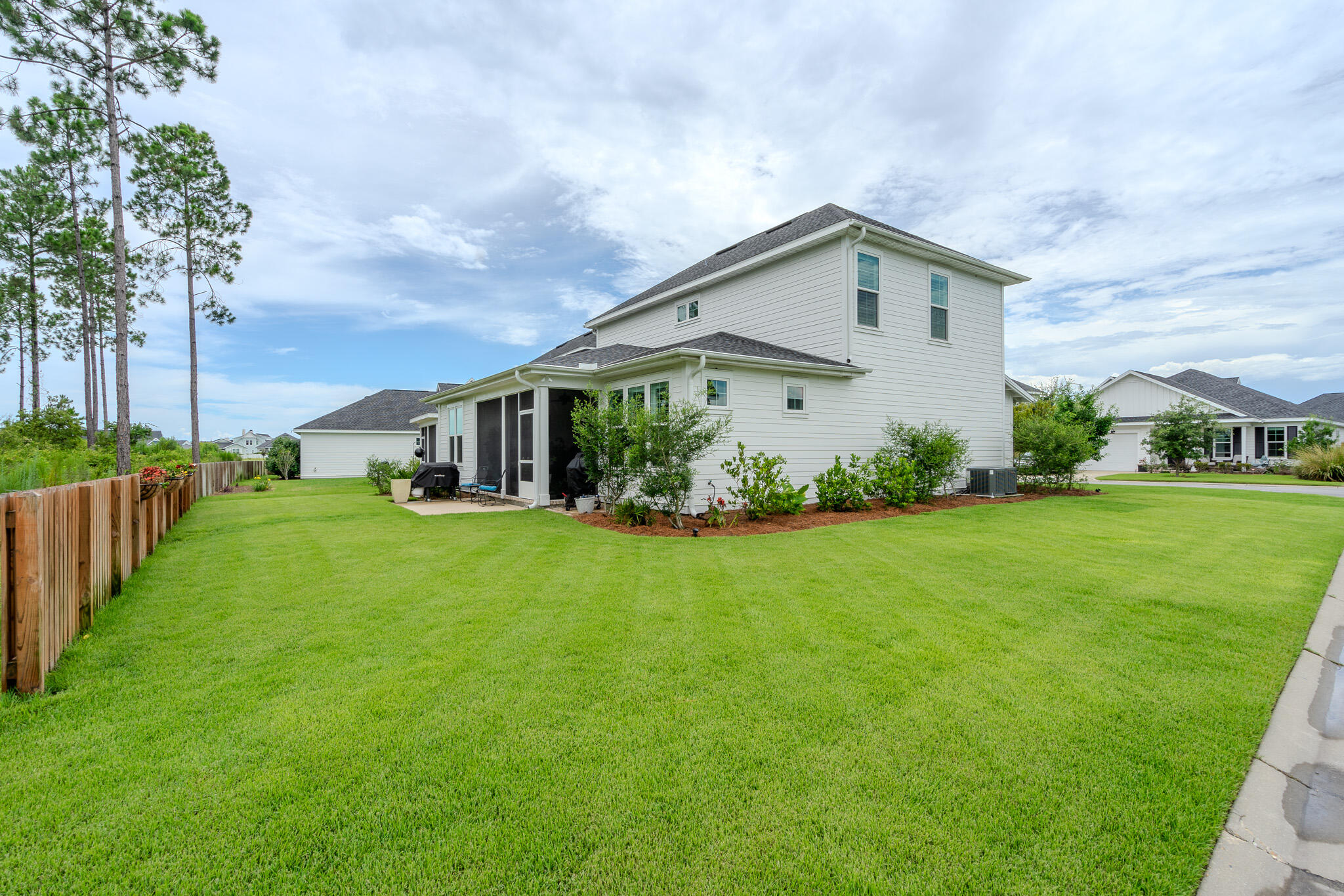 75 Conifer Ct Inlet Beach Inlet Beach, FL 32461 - Photo 3 of 74 a front view of house with garden