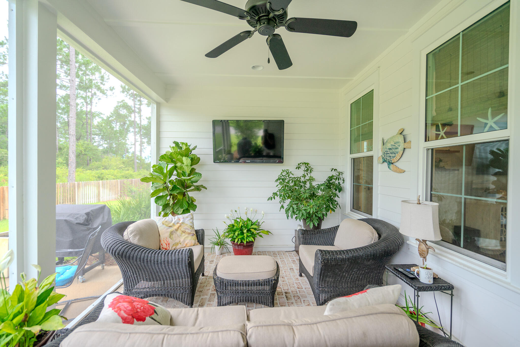 75 Conifer Ct Inlet Beach Inlet Beach, FL 32461 - Photo 49 of 74 a living room with furniture potted plant and a large window