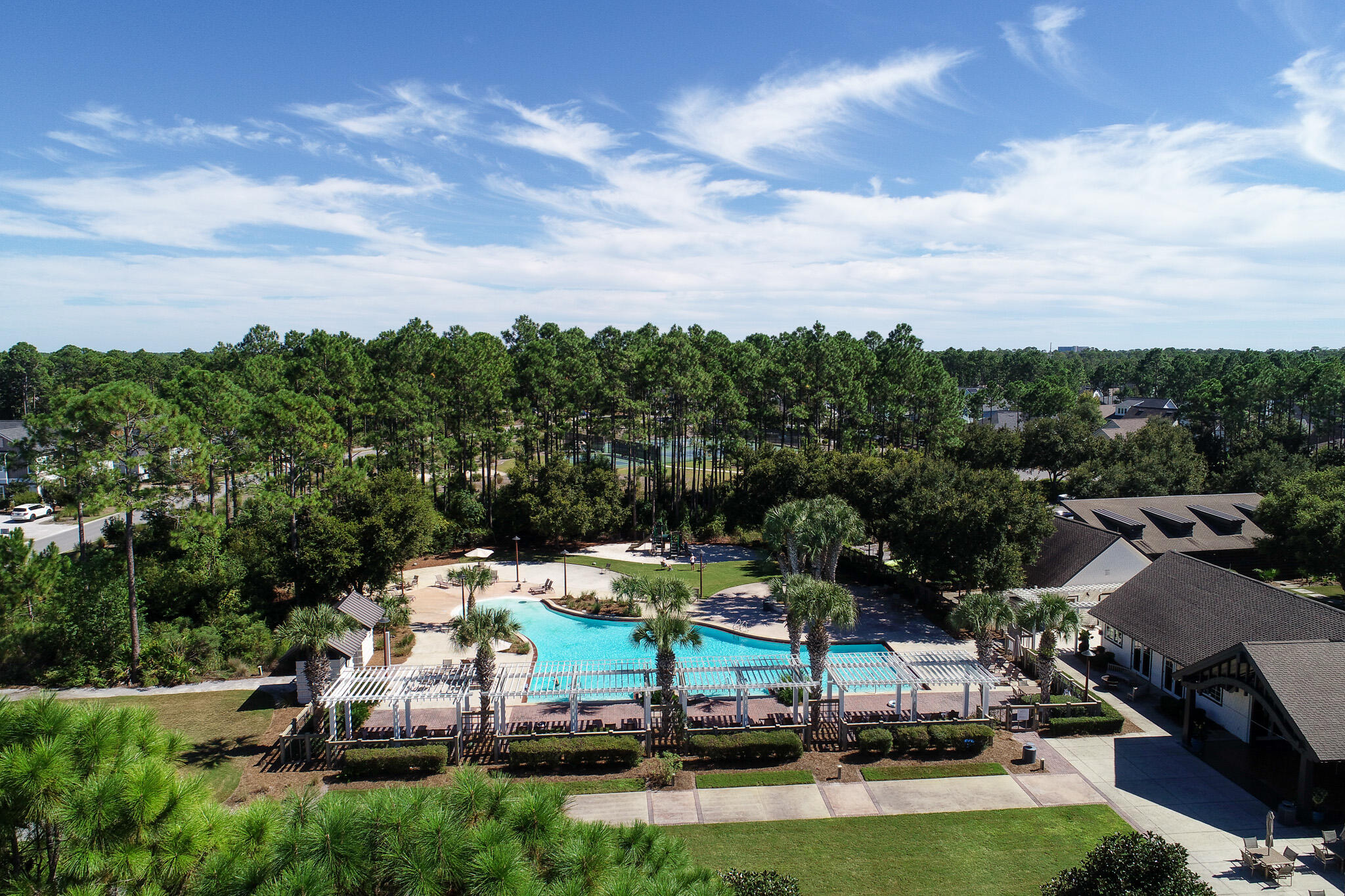 75 Conifer Ct Inlet Beach Inlet Beach, FL 32461 - Photo 68 of 74 a view of a swimming pool with lawn chairs