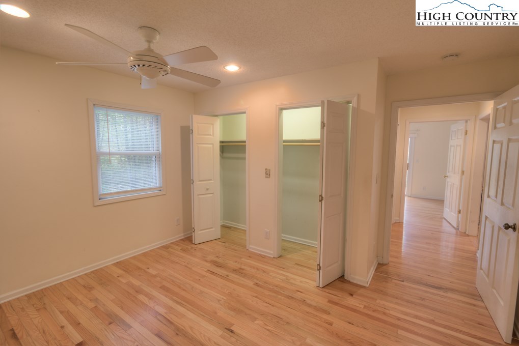 305 Signal Tree Road Deep Gap, NC 28618 - Photo 17 of 33 a view of an empty room with wooden floor
