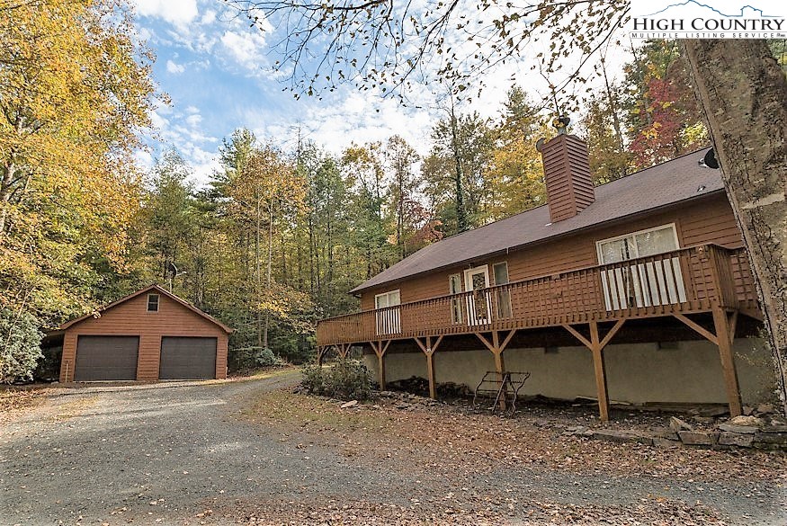 305 Signal Tree Road Deep Gap, NC 28618 - Photo 3 of 33 front view of a house with a yard