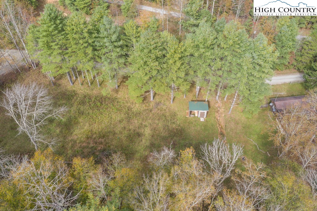 305 Signal Tree Road Deep Gap, NC 28618 - Photo 31 of 33 a bathroom with a small yard and green space