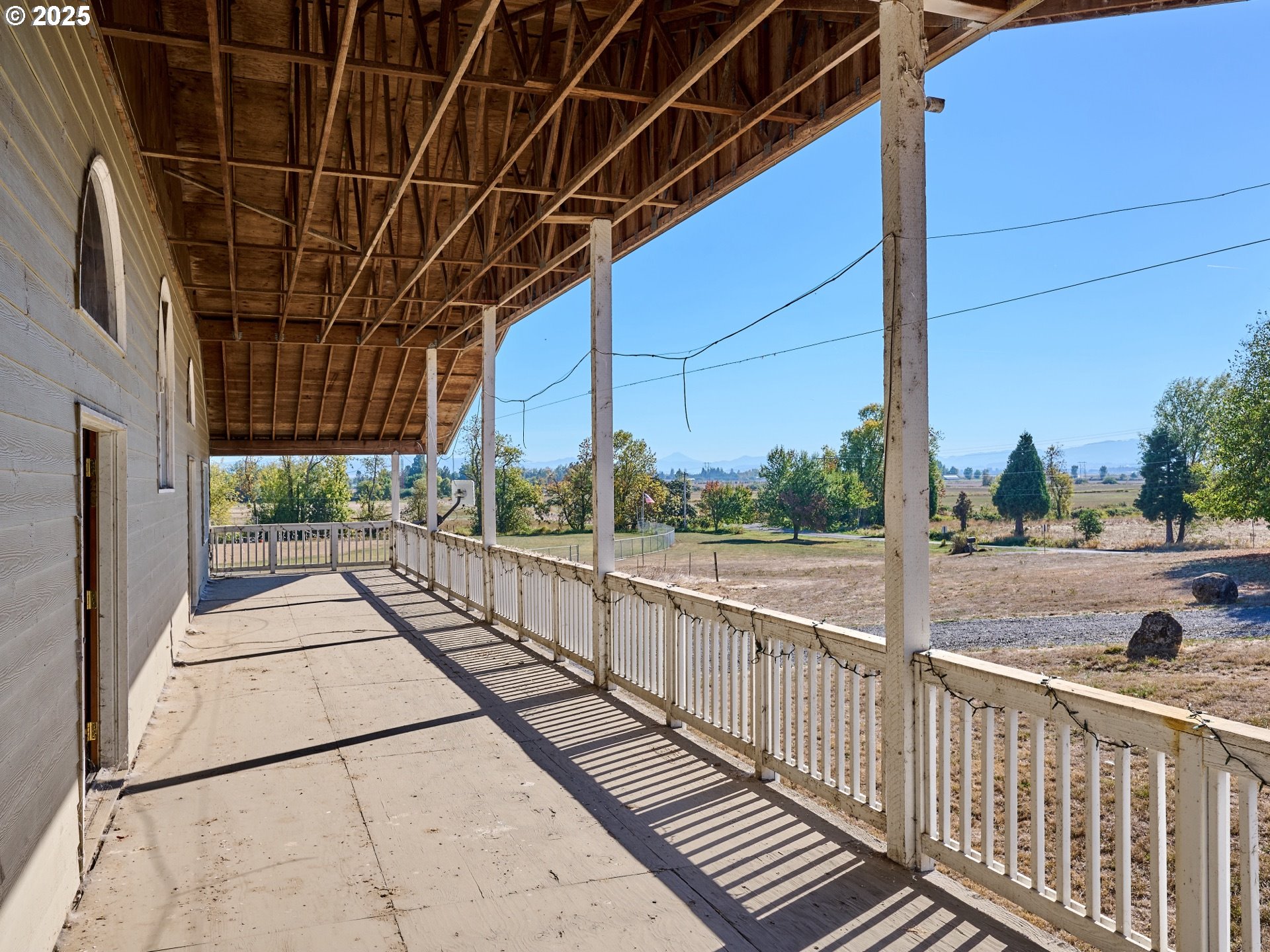 4481 Hennies Road Southeast Turner, OR 97392 - Photo 11 of 47 a view of a street with wooden fence