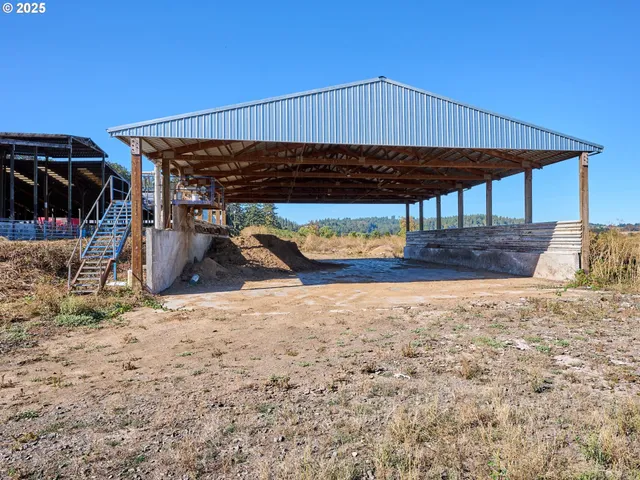 a view of roof with wooden fence
