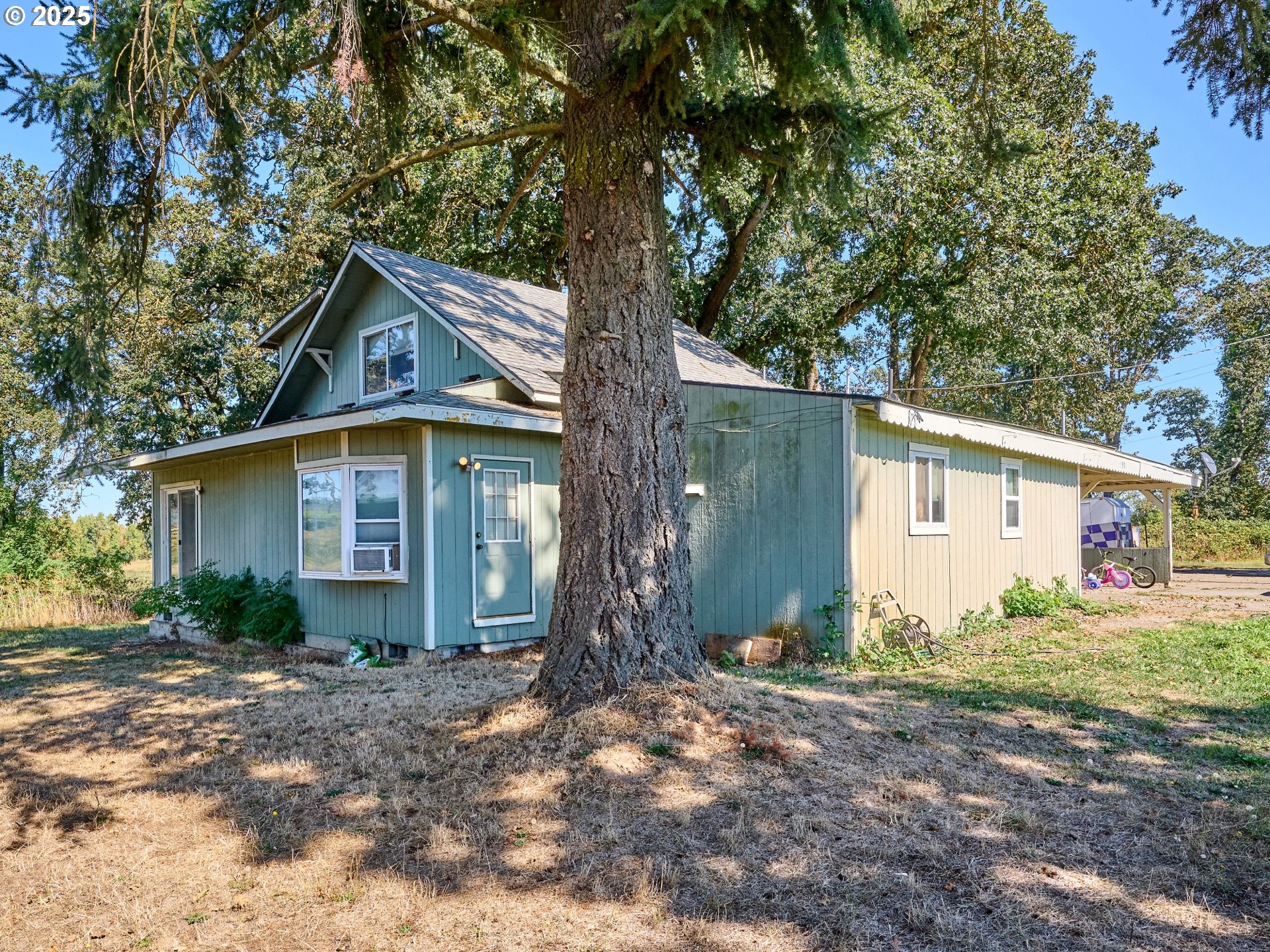 4481 Hennies Road Southeast Turner, OR 97392 - Photo 33 of 47 a front view of house with yard and trees around
