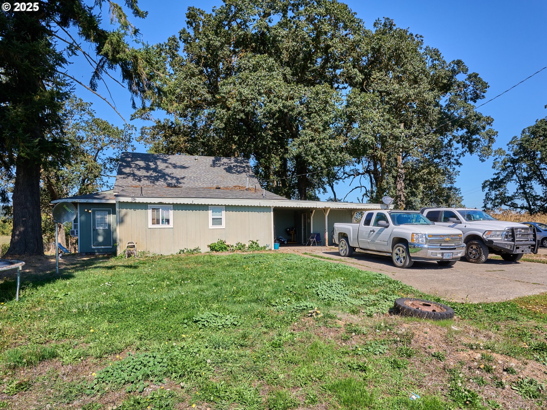 4481 Hennies Road Southeast Turner, OR 97392 - Photo 34 of 47 a view of a house with a yard and sitting area