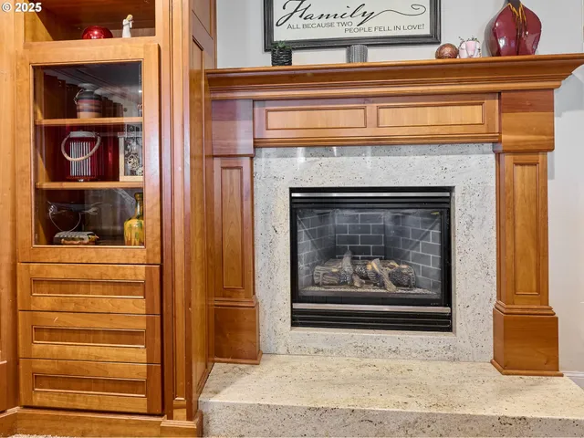 a living room with a fireplace