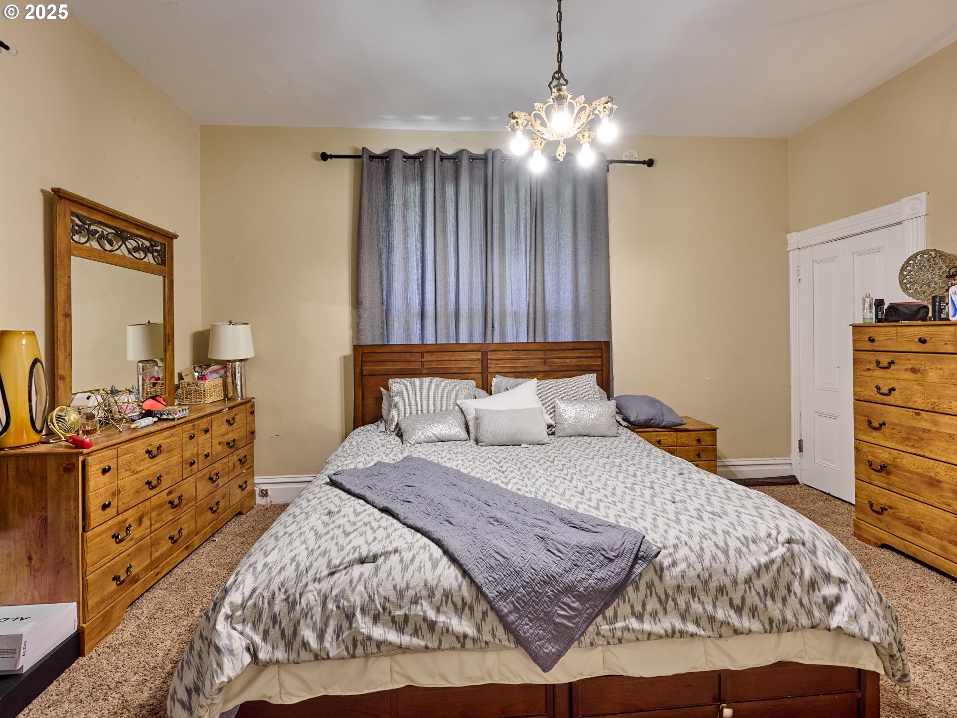 4481 Hennies Road Southeast Turner, OR 97392 - Photo 7 of 47 a bedroom with a bed and wooden floor