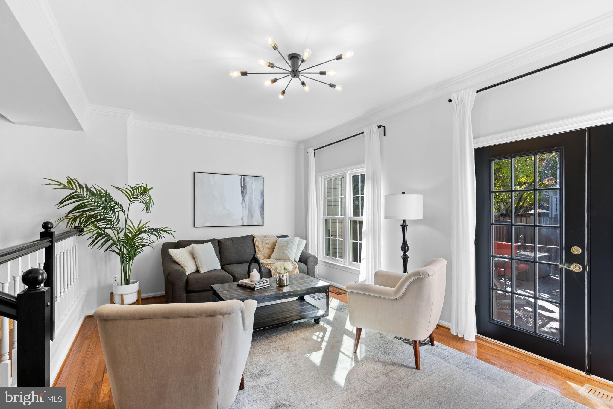 6223 Walkers Croft Way Alexandria, VA 22315 - Photo 15 of 38 a living room with furniture and a large window